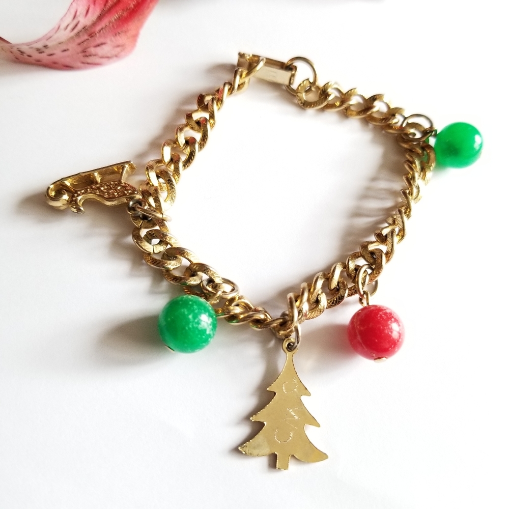 Vintage Christmas charm bracelet gold tone red green tree sleigh